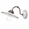 Rustic ceramic wall sconce made in Italy by Ferroluce