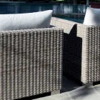 Outdoor seating composition with hand-woven structure Rita Viadurini