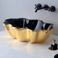 Countertop washbasin in golden and black ceramic made in Italy Cubo