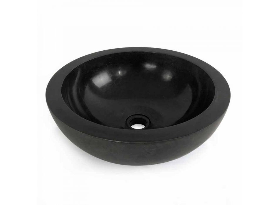 Black round countertop washbasin in Levi natural stone, unique piece