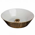 Circular sit-on sink in porcelain and 24 carat gold, Felice