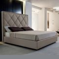 Upholstered double bed covered in fabric or leather - Celebre