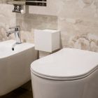 Bathroom Roll Holder in White Corian or with Black Inserts Italian Design - Elono Viadurini