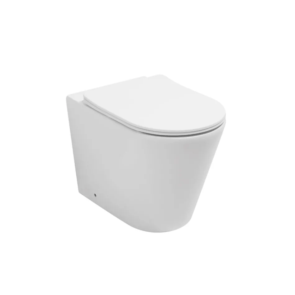 Floor-mounted toilet with slim soft-close seat in white ceramic - Salice Viadurini