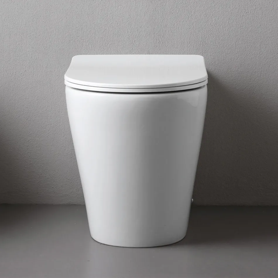 Floor-mounted toilet with slim soft-close seat in white ceramic - Salice Viadurini