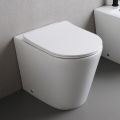 Floor-mounted toilet with slim soft-close seat in white ceramic - Salice