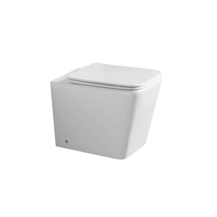 Floor-mounted toilet with soft-close ceramic seat and modern design - Giunco Viadurini