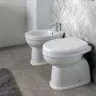 Floor-mounted ceramic toilet with polyester seat and modern design - Silica Viadurini