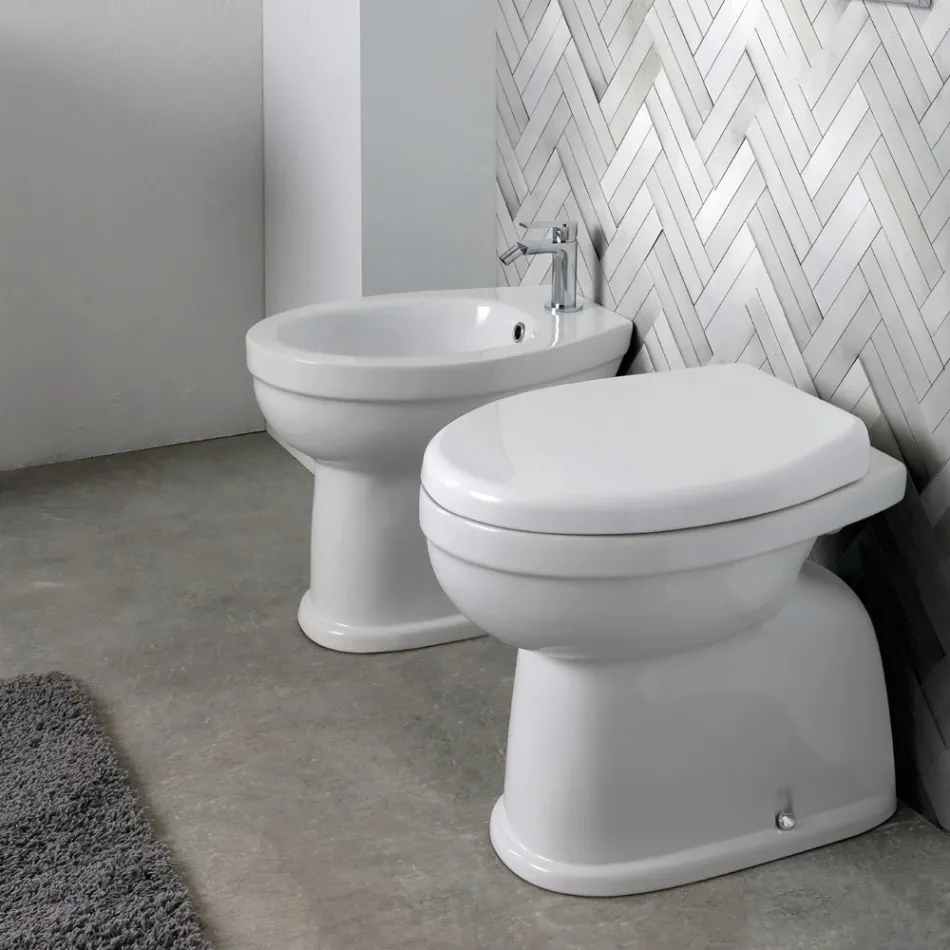 Floor-mounted ceramic toilet with polyester seat and modern design - Silica Viadurini