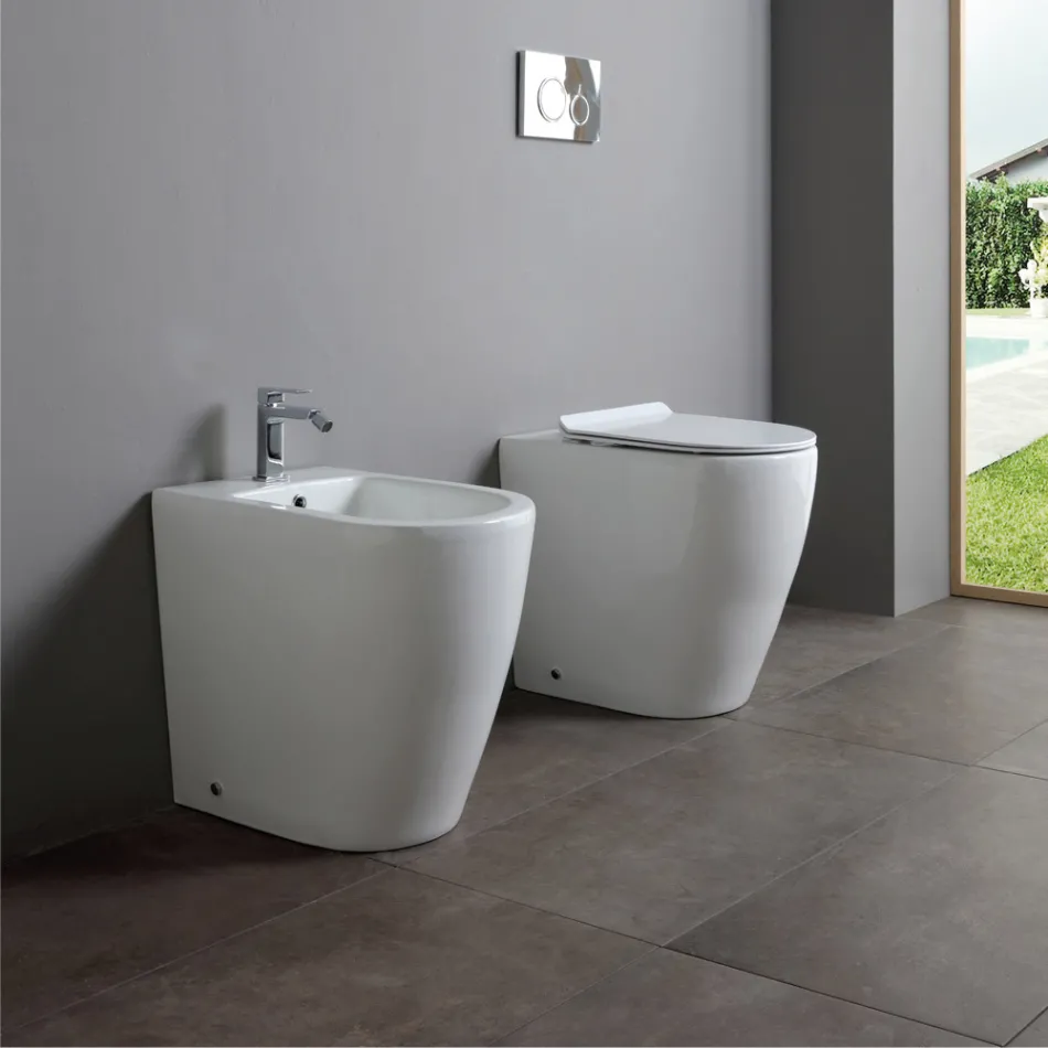 Oleander Ceramic Toilet with Slide-Out Drain and Soft-Close Seat Viadurini