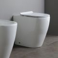 Oleander Ceramic Toilet with Slide-Out Flush and Soft-Close Seat