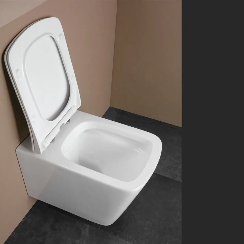 Wall-hung toilet with soft-close ceramic seat in a modern design - Giunco Viadurini